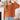 A woman wearing a fuzzy long-sleeve crewneck sweater in burnt orange, paired with distressed light blue jeans, standing in a bright, modern living room.