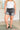 Greyson High Rise Button Fly Cuffed Shorts in Grey