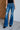 Gabriella Mid Rise Distressed Button Fly Flare Jeans