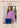 A model photo with text reading 'MODEL MEASUREMENTS Sarah' and sizing details for a small size 0. The model is wearing a light purple cropped knit sweater and blue jeans in a bright indoor setting.